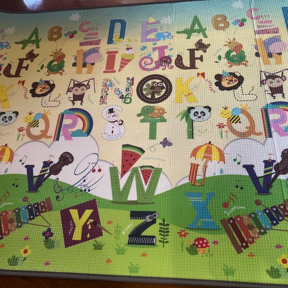 New in original Package- Baby Floor Mat- Double sided Pictures and alphabet!